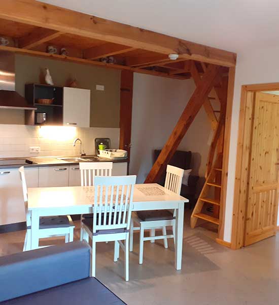 Treppe in das Obergeschoss der Ferienwohnung Heuboden