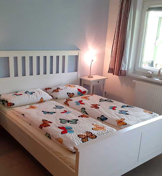 Schlafzimmer in der Ferienwohnung Kornboden