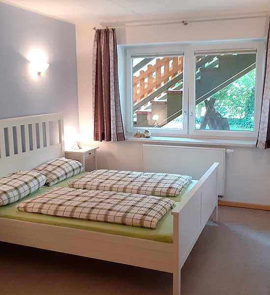 Schlafzimmer in der Ferienwohnung Ochsenstall
